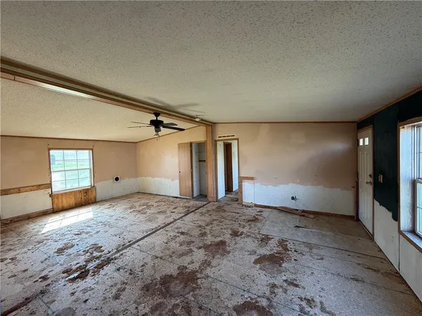 a view of a livingroom with wooden floor