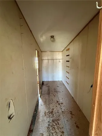 a bathroom with a glass door shower