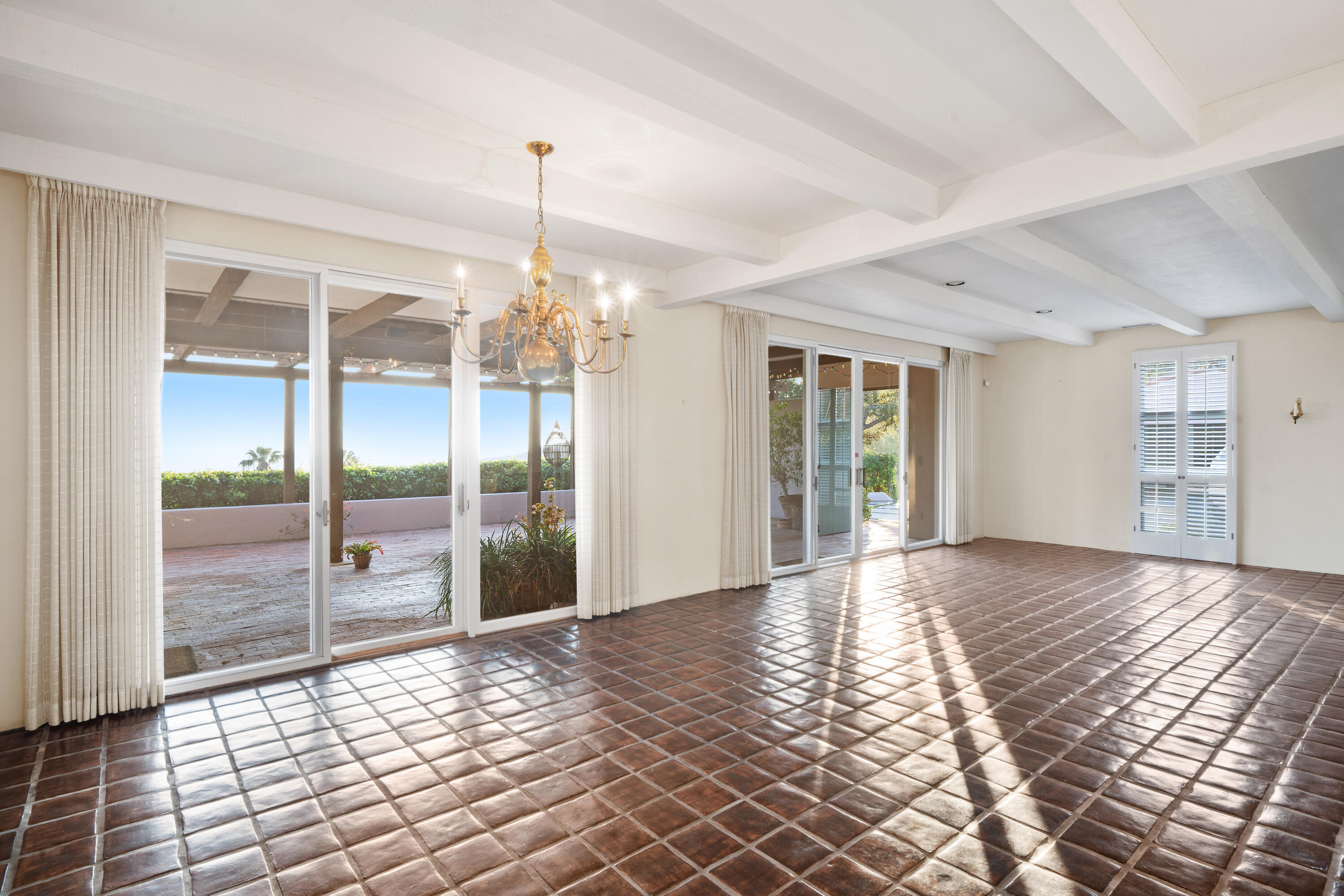 1986 Arriba Street Carpinteria, CA 93013 - Photo 14 of 25 a view of a room with window and wooden floor