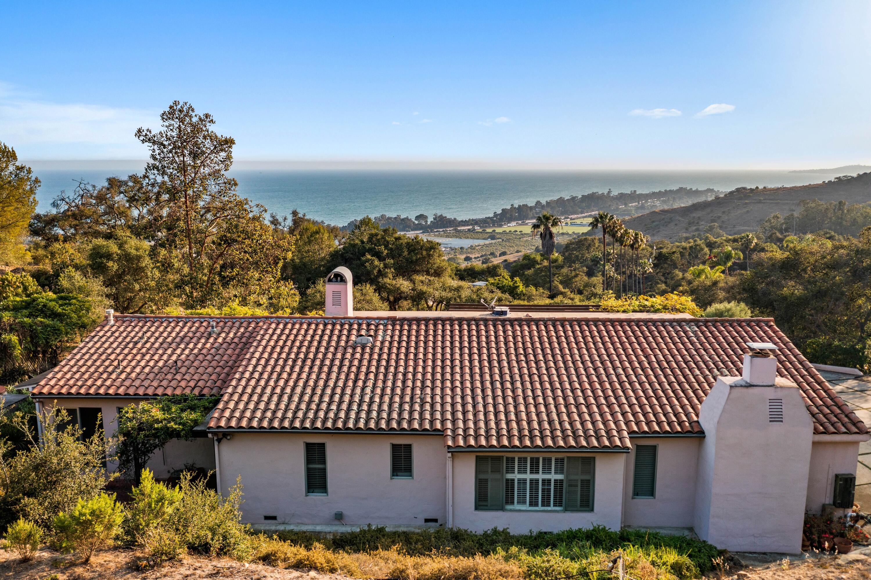 1986 Arriba Street Carpinteria, CA 93013 - Photo 6 of 25 a view of a patio with a table and chairs