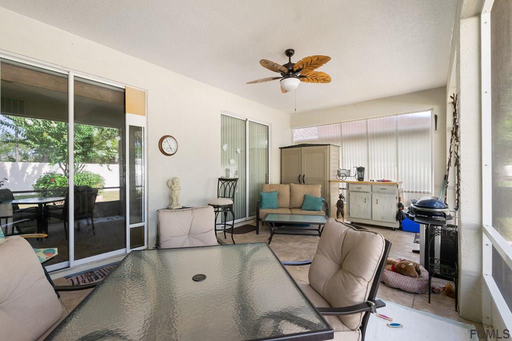 16 Raintree Circle Palm Coast, FL 32164 - Photo 35 of 45 a living room with furniture
