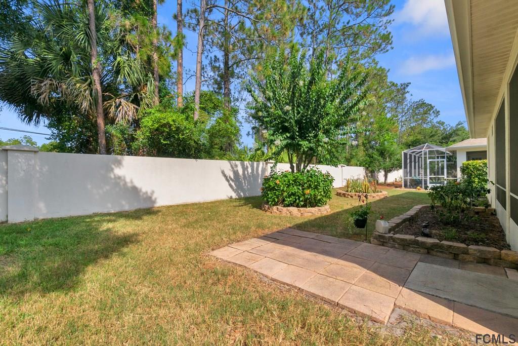 16 Raintree Circle Palm Coast, FL 32164 - Photo 39 of 45 a view of back yard of the house