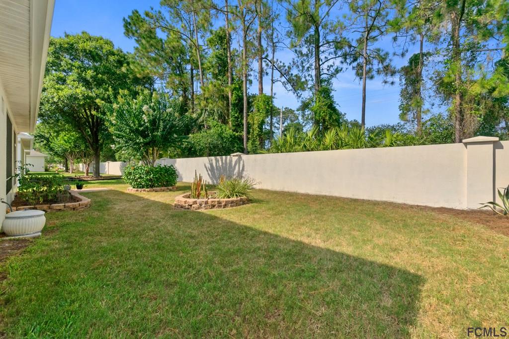 16 Raintree Circle Palm Coast, FL 32164 - Photo 42 of 45 a view of an outdoor space and a yard