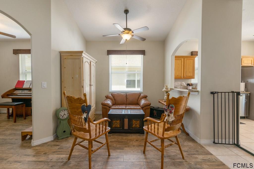 16 Raintree Circle Palm Coast, FL 32164 - Photo 10 of 45 a dining room with furniture and window