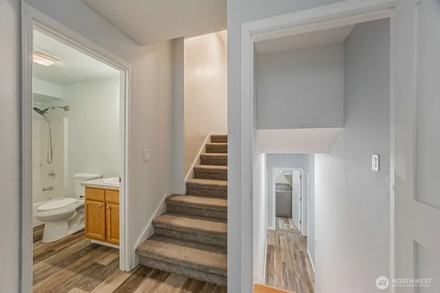 a view of a bathroom from the hallway