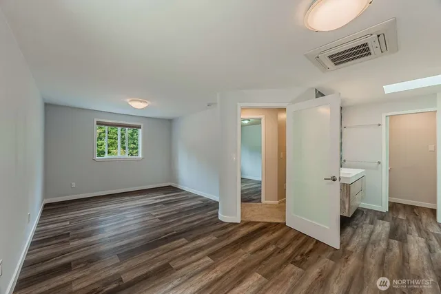 a view of an empty room and window