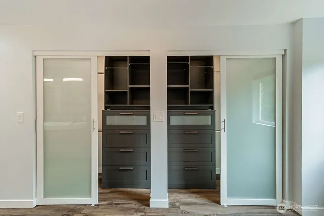 hallway view with wooden cabinets