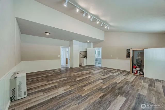 a view of a livingroom with wooden floor