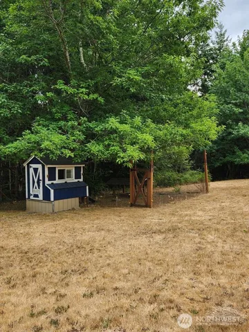 a house with trees in front of it