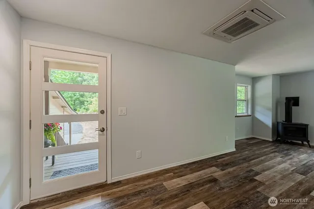 a view of an empty room and window