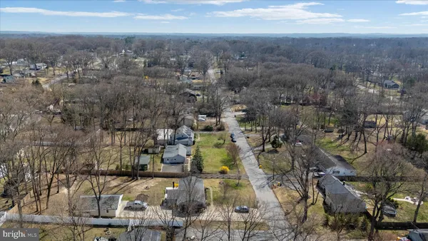 an aerial view of residential house with parking space