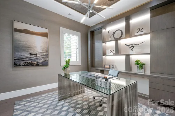 a kitchen with stainless steel appliances granite countertop a sink and a refrigerator