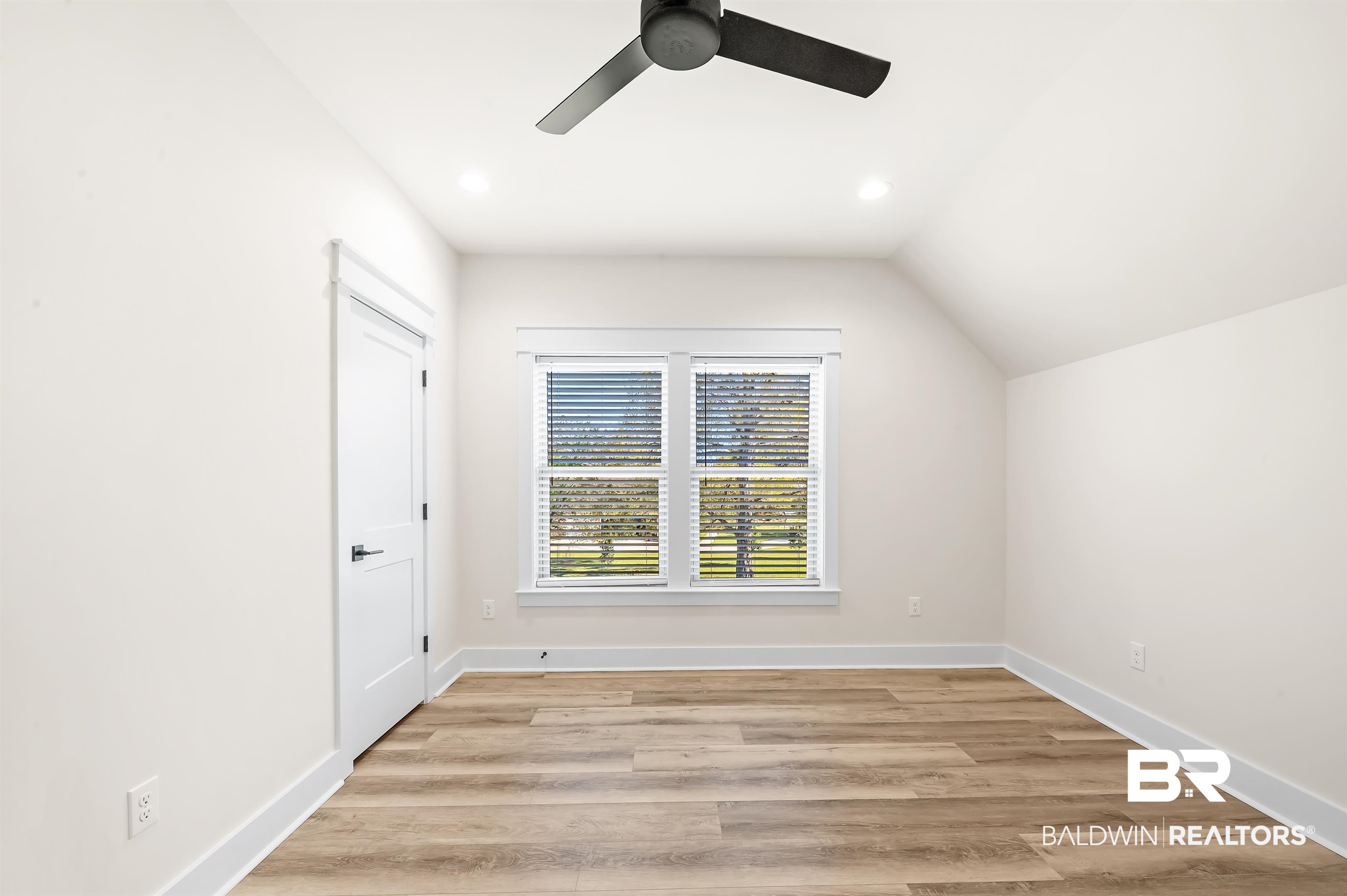 9144 Harvest Ridge Fairhope, AL 36532 - Photo 48 of 58 Additional living space featuring baseboards, light wood-type flooring, and ceiling fan