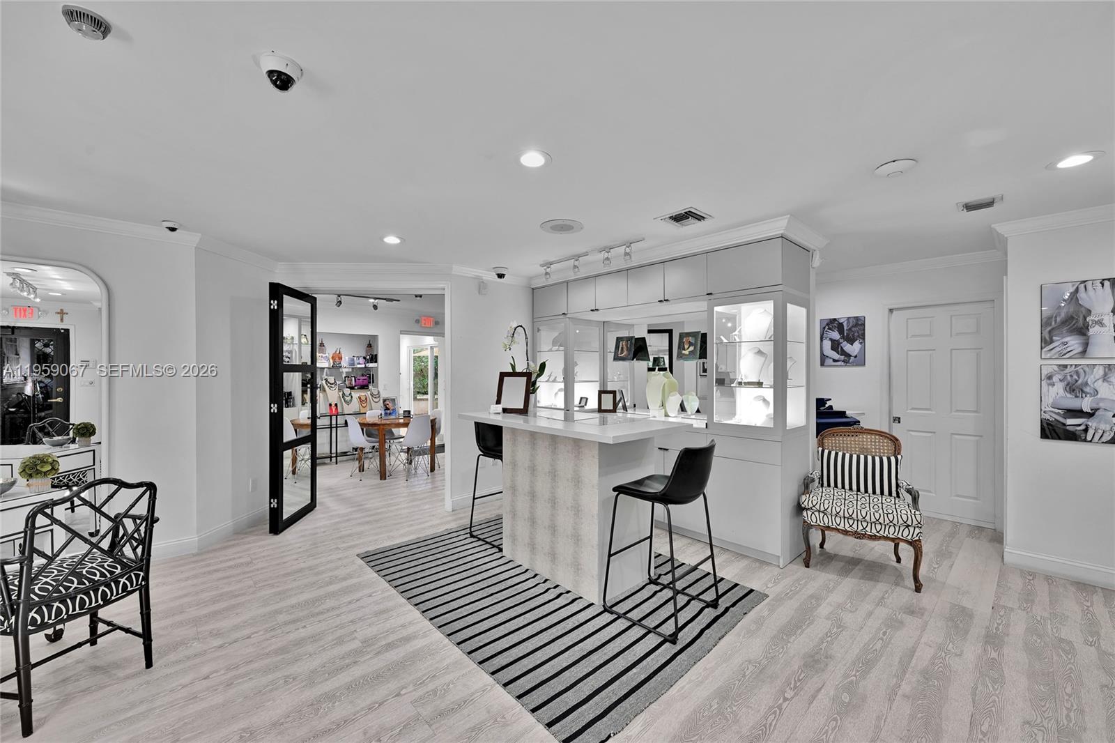 2212 Southwest 22nd Avenue Miami, FL 33145 - Photo 2 of 32 a living room with furniture and a wooden floor
