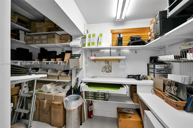 a kitchen with a stove and cabinets