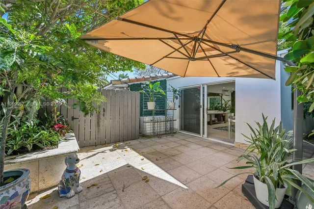 a house view with a garden space