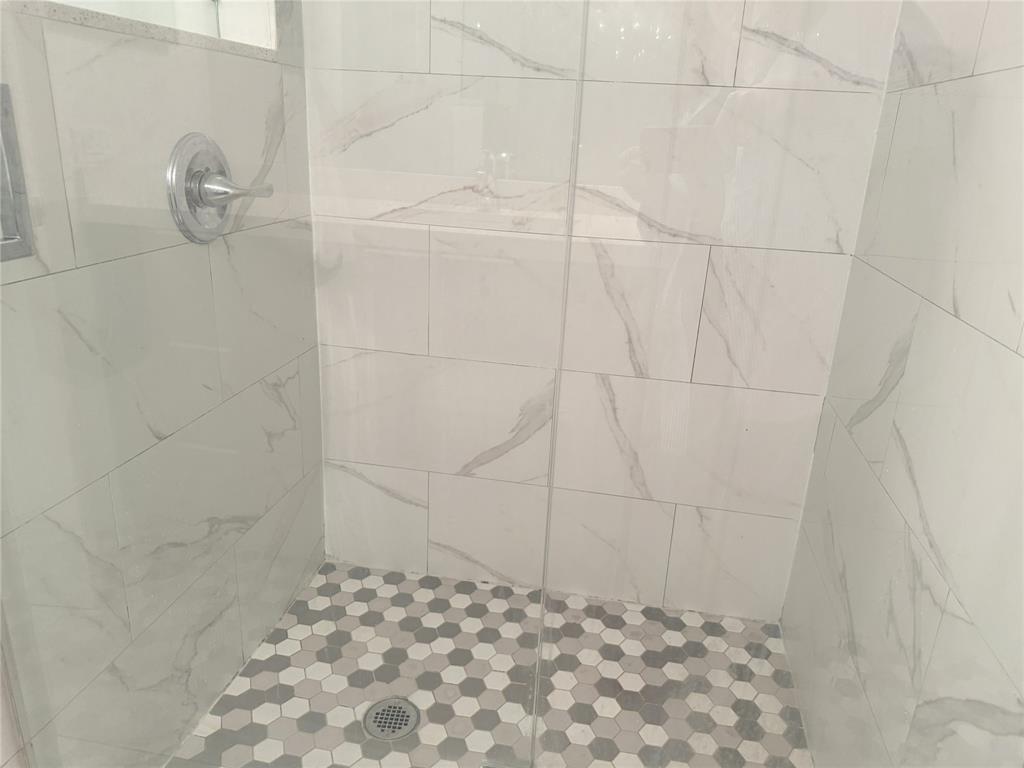6800 Cypress Road, Unit 102 Plantation, FL 33317 - Photo 21 of 29 a bathroom with a shower