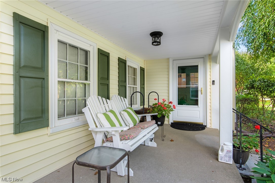 View of terrace featuring a porch