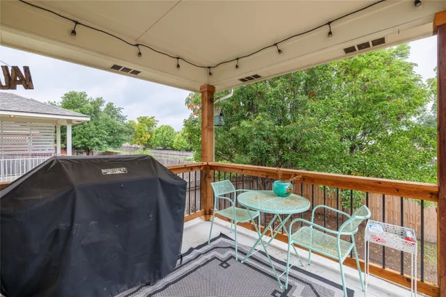 a view of a patio in a backyard