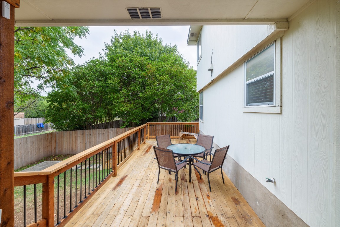 1130 Sundrop Place Round Rock, TX 78665 - Photo 18 of 19 a balcony view with two chairs and a table