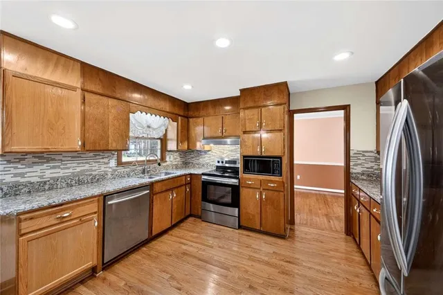 $400,000 | 5657 Bob White Circle Northwest, Lilburn, GA 30047