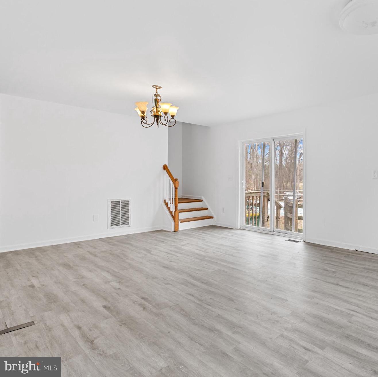 125 Oliver Guessford Road Townsend, DE 19734 - Photo 31 of 48 a view of an empty room with stairs