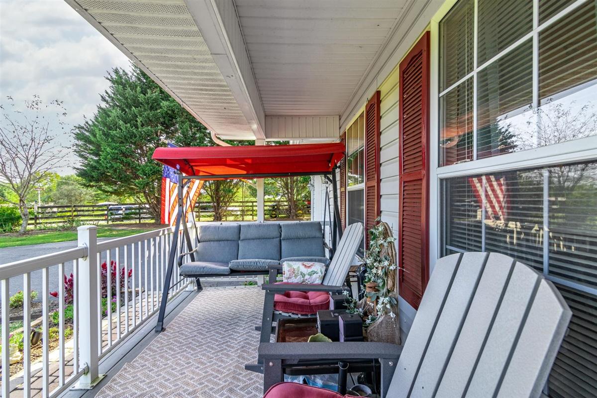 1849 Morgans Mill Road Goodview, VA 24095 - Photo 4 of 40 a view of balcony with furniture