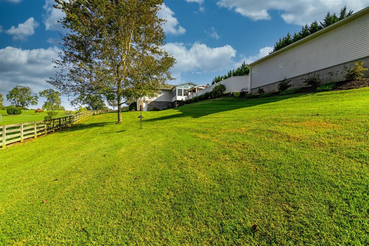 1849 Morgans Mill Road Goodview, VA 24095 - Photo 35 of 40 a view of an outdoor space and basketball court