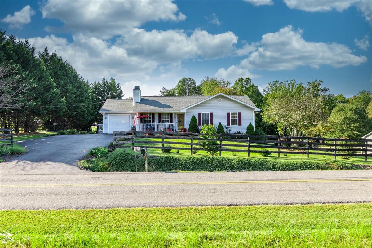 1849 Morgans Mill Road Goodview, VA 24095 - Photo 37 of 40 a front view of a house with a yard