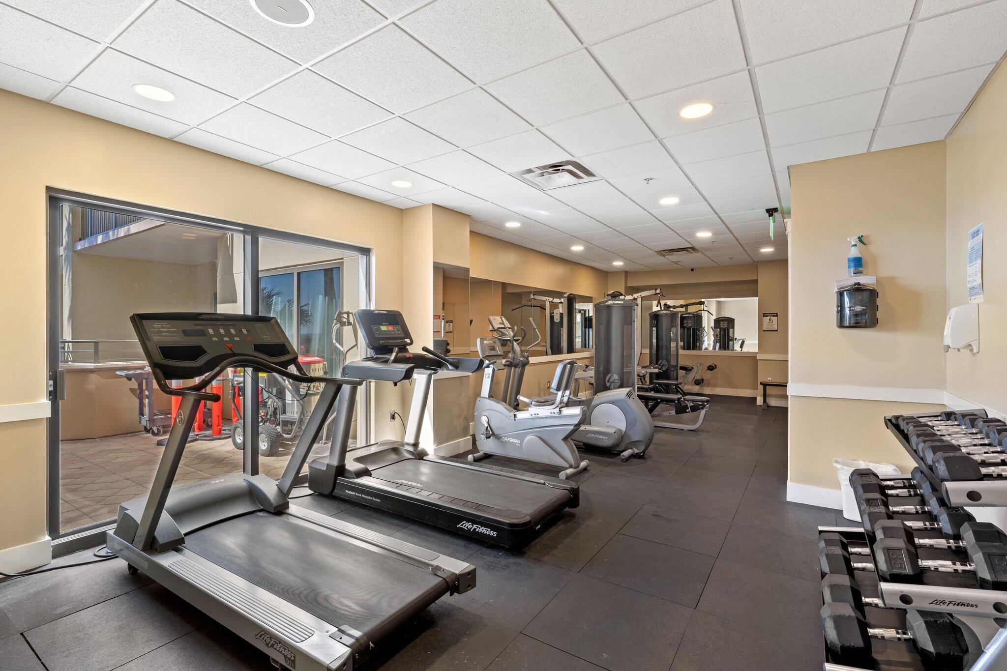 15100 Front Beach Road, Unit 1302 Panama City Beach, FL 32413 - Photo 57 of 67 a view of a room with gym equipment