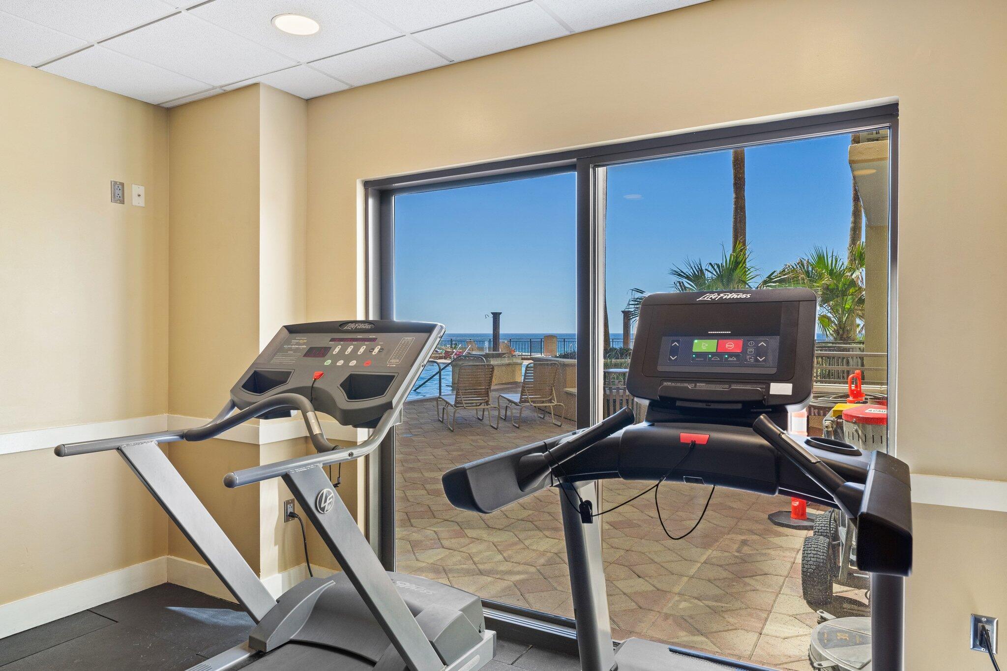 15100 Front Beach Road, Unit 1302 Panama City Beach, FL 32413 - Photo 58 of 67 a living room with furniture and a flat screen tv