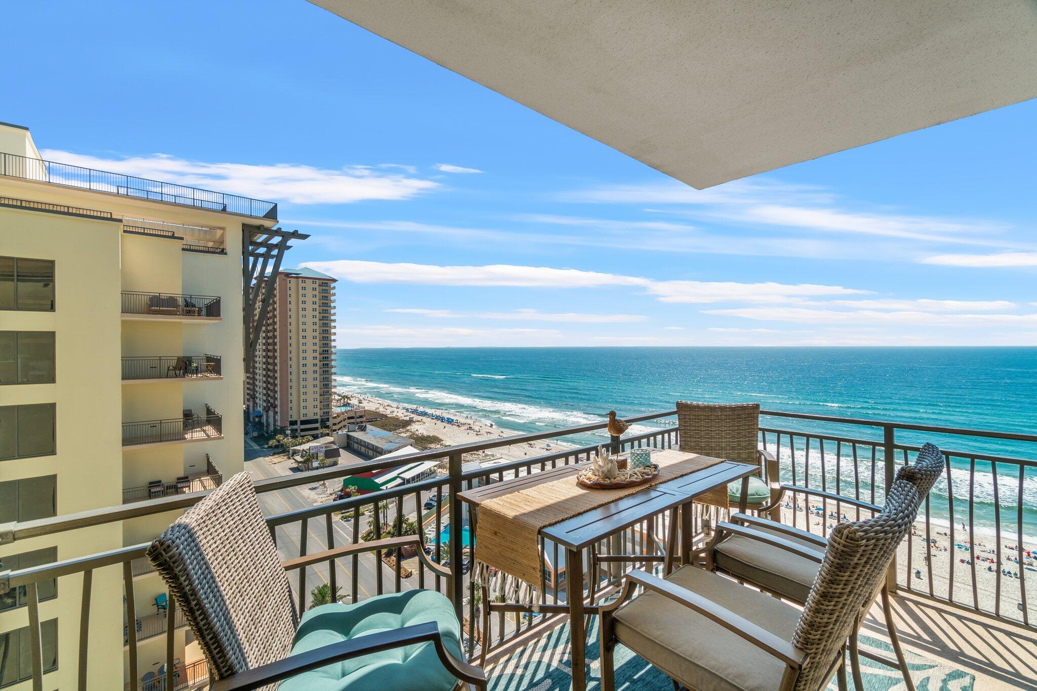 15100 Front Beach Road, Unit 1302 Panama City Beach, FL 32413 - Photo 7 of 67 a view of a balcony with chairs
