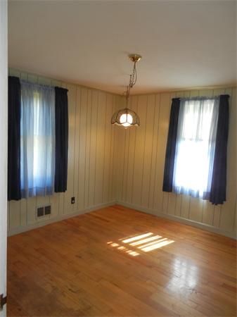 18 Arnold Road Peabody, MA 01960 - Photo 12 of 16 an empty room with windows and entrance