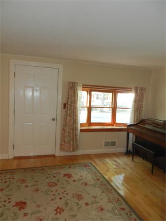 18 Arnold Road Peabody, MA 01960 - Photo 3 of 16 a bedroom with a bed and a window