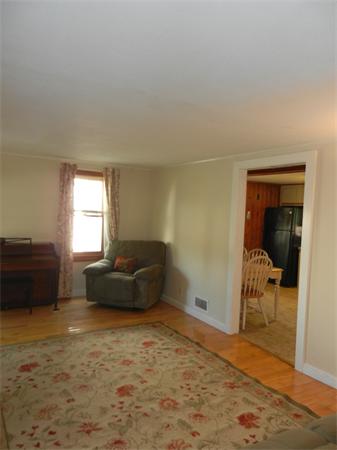 18 Arnold Road Peabody, MA 01960 - Photo 4 of 16 a living room with furniture and a window