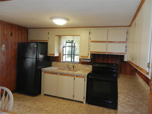 18 Arnold Road Peabody, MA 01960 - Photo 5 of 16 a kitchen with a refrigerator stove and sink
