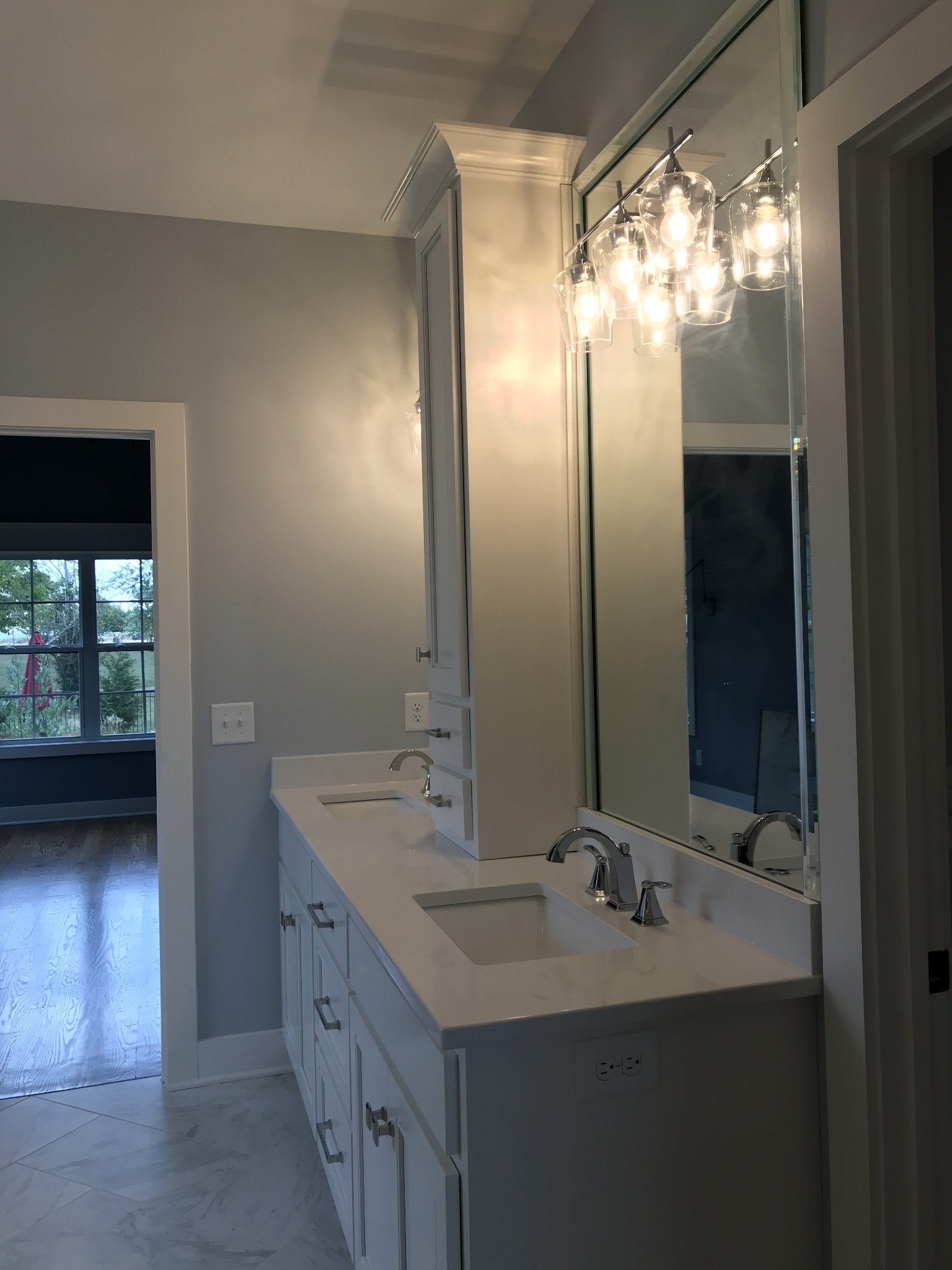 205 Old Horn Springs Road Lebanon, TN 37087 - Photo 14 of 27 a bathroom with a double vanity sink and a mirror