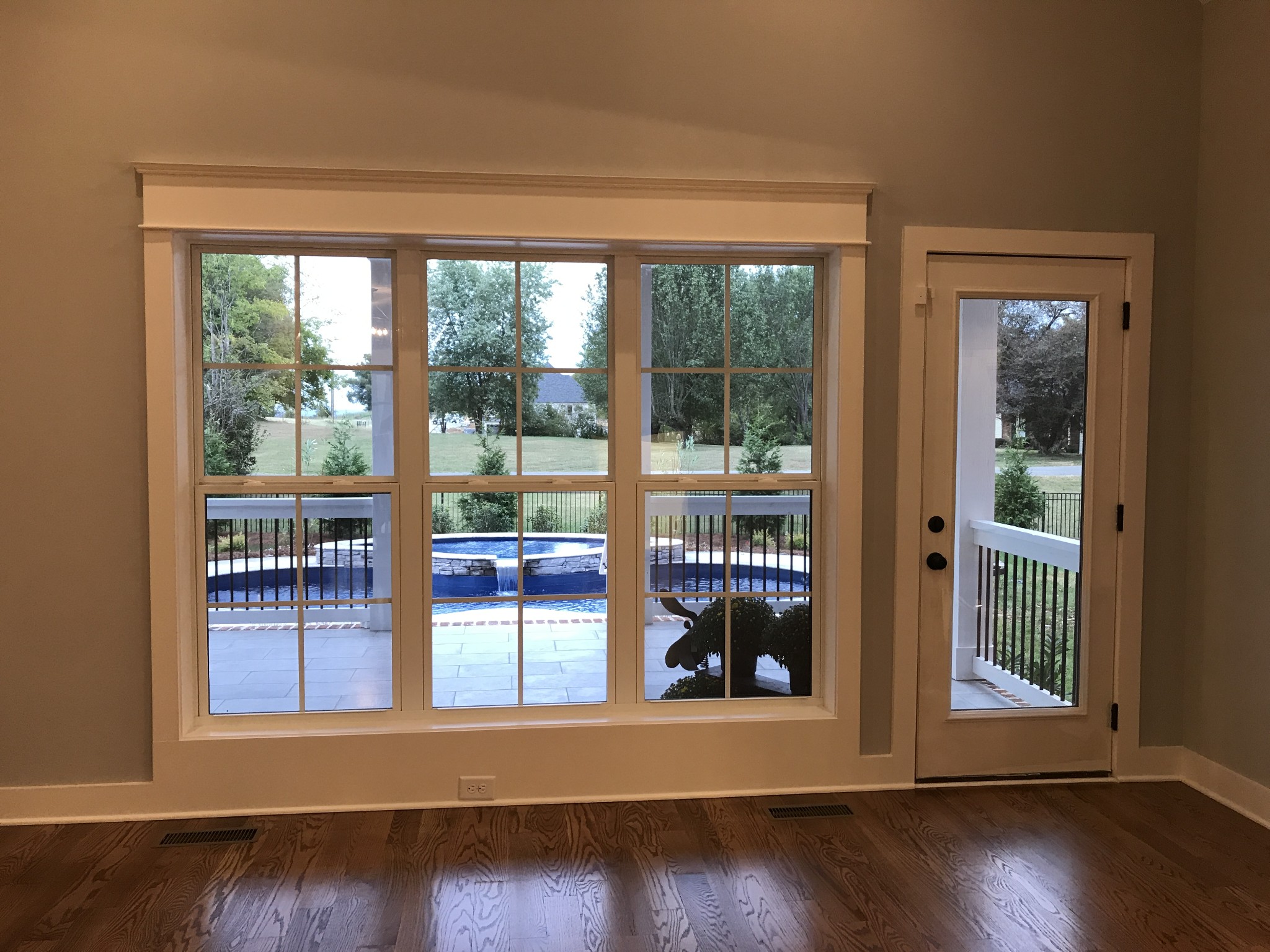 205 Old Horn Springs Road Lebanon, TN 37087 - Photo 21 of 27 a view of a room that has wooden floor and a window