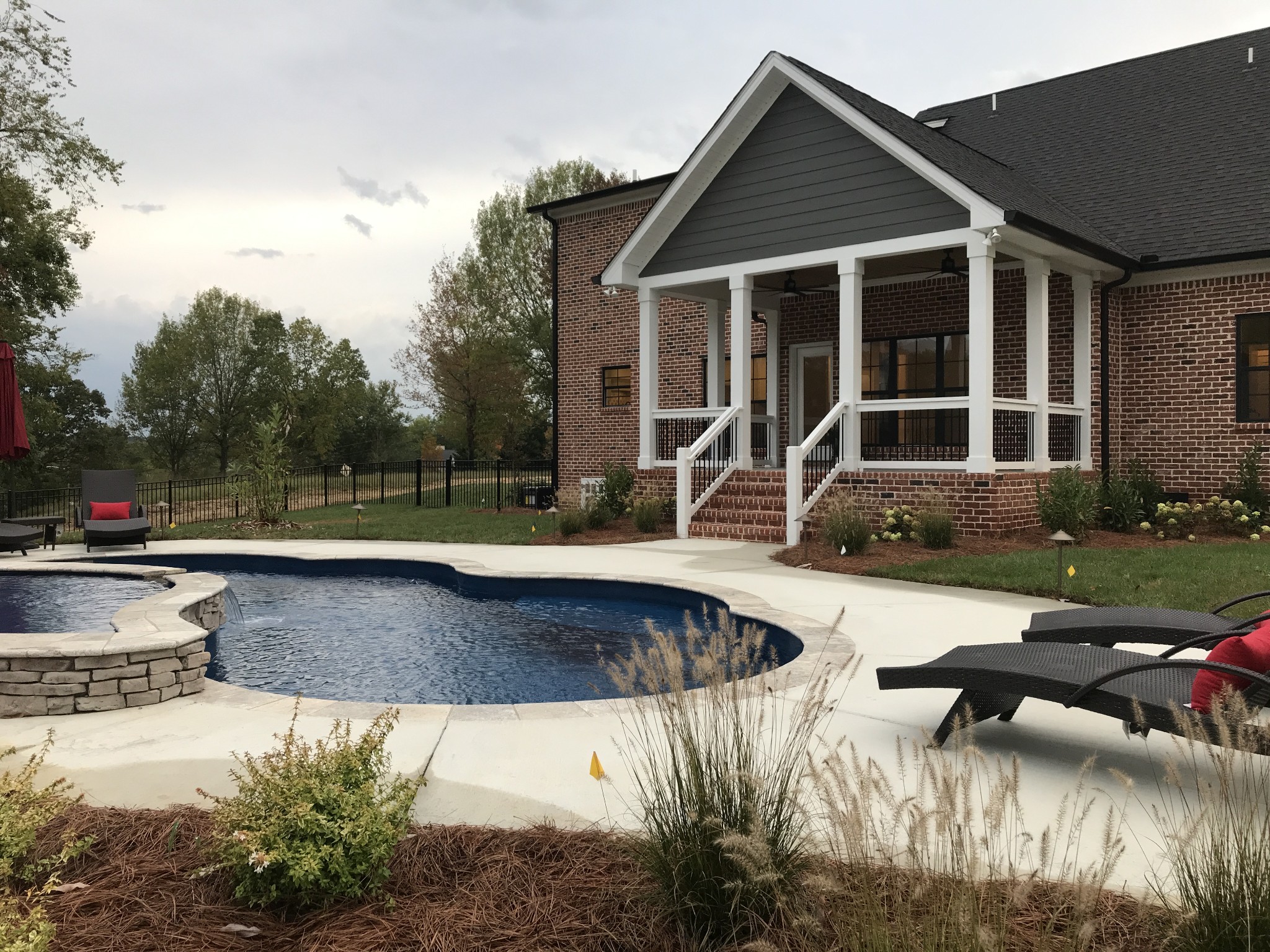 205 Old Horn Springs Road Lebanon, TN 37087 - Photo 5 of 27 a view of a house with pool and a yard