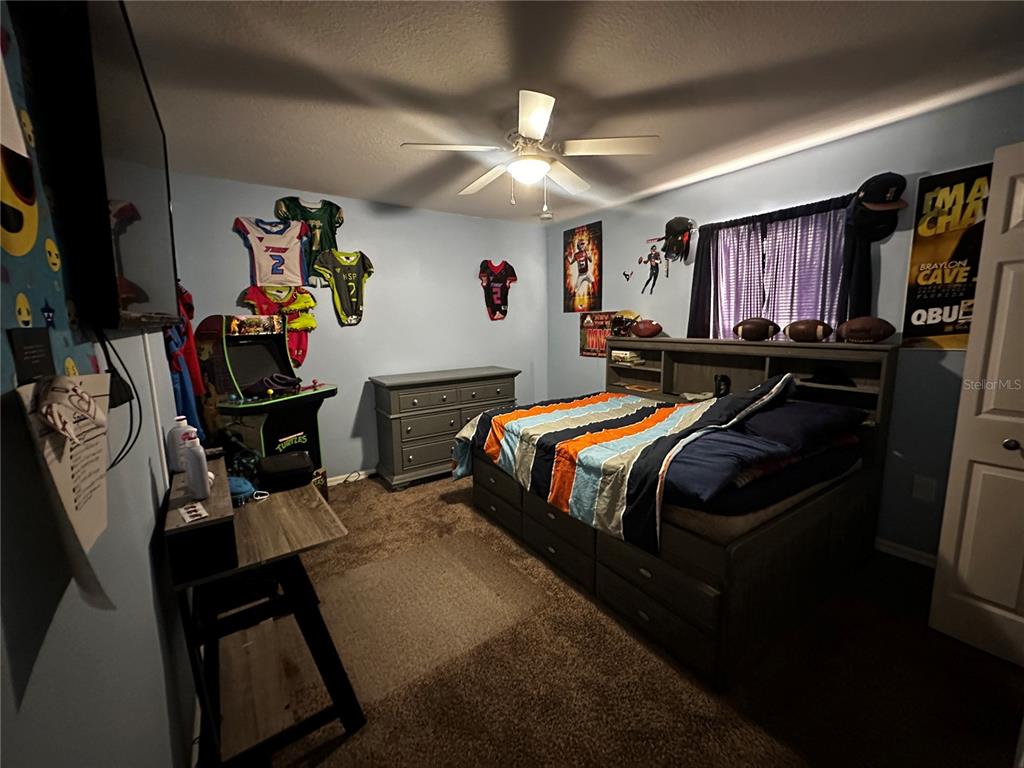 15040 Southwest 39th Circle Ocala, FL 34473 - Photo 13 of 23 a bedroom with bed and a window