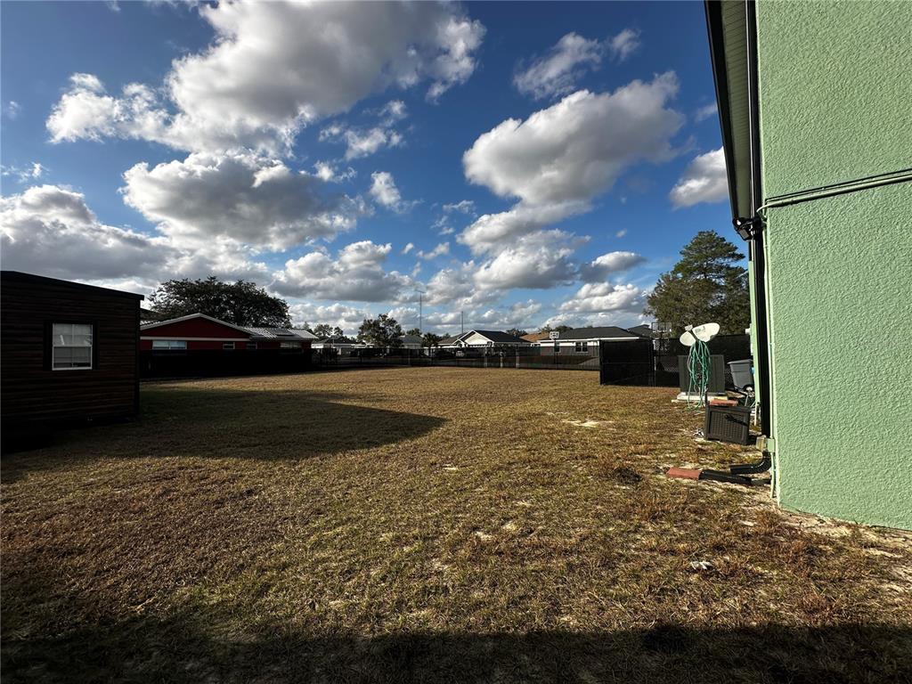 15040 Southwest 39th Circle Ocala, FL 34473 - Photo 2 of 23 a view of outdoor space with swimming pool