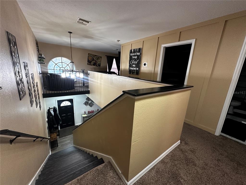 15040 Southwest 39th Circle Ocala, FL 34473 - Photo 23 of 23 a view of a living room with furniture and a flat screen tv