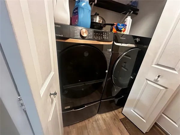 a utility room with dryer and washer
