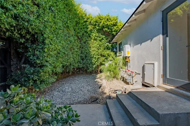 a living room with furniture and windows