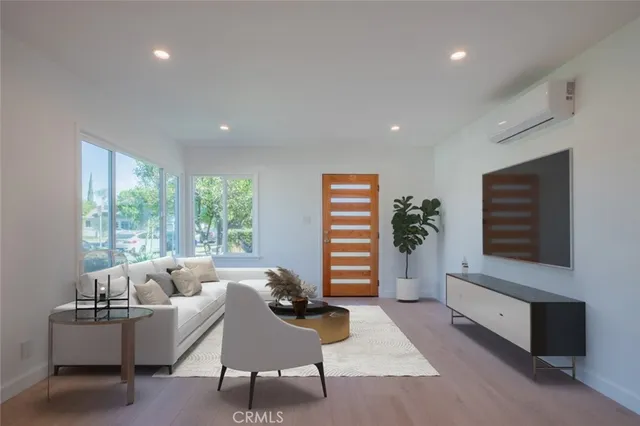 a living room with furniture and a couch