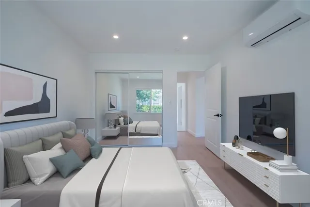 a view of a patio with table and chairs with wooden floor and fence