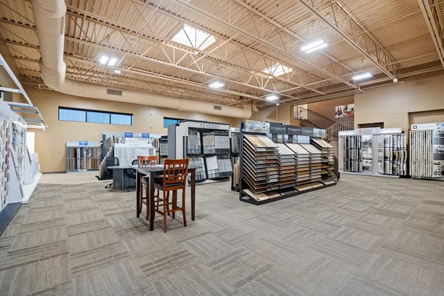 a view of a workspace with furniture