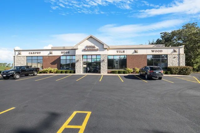 a view of a swimming pool with a yard