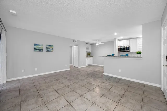 $139,900 | 3295 Fox Chase Circle, Unit 105, Palm Harbor, FL 34683