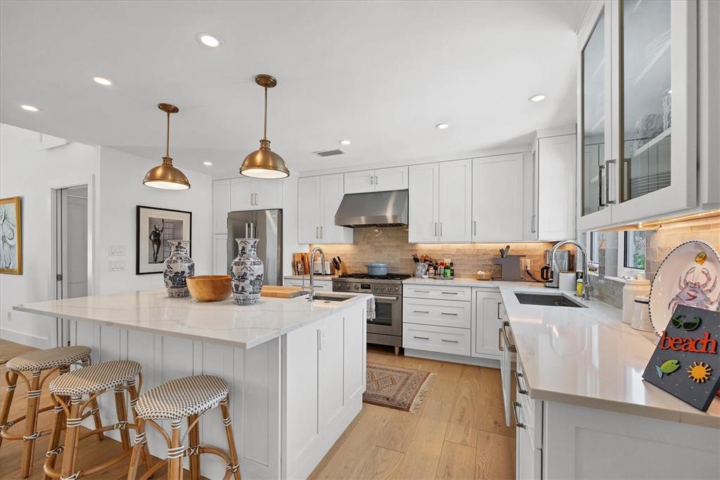 355 Barbarossa Street Boca Grande, FL 33921 - Photo 13 of 47 a large kitchen with granite countertop lots of counter top space